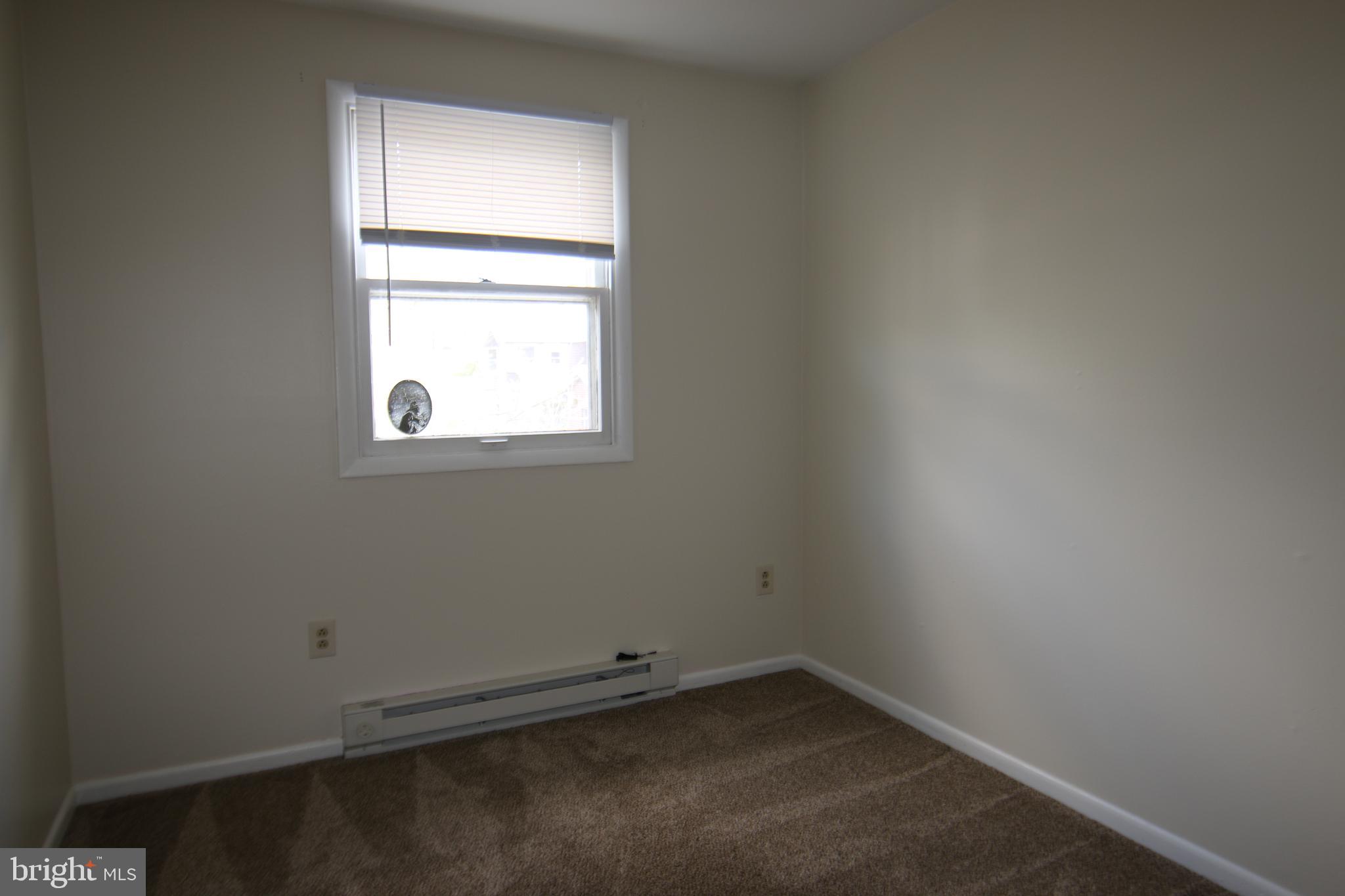 2121 Market St Extension Middletown, PA 17057 - Photo 10 of 19 an empty room with a window