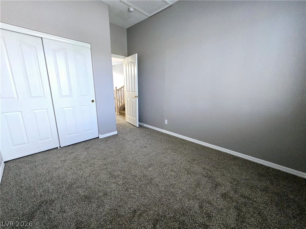 3759 Funston Way Las Vegas, NV 89129 - Photo 4 of 31 A spacious bedroom featuring plush carpeting and a large closet for ample storage.