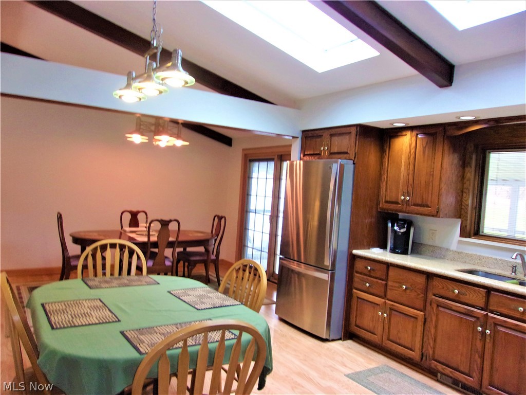 546 Spring Pond Road Northfield, OH 44067 - Photo 3 of 20 Open kitchen dining area with newer skylights