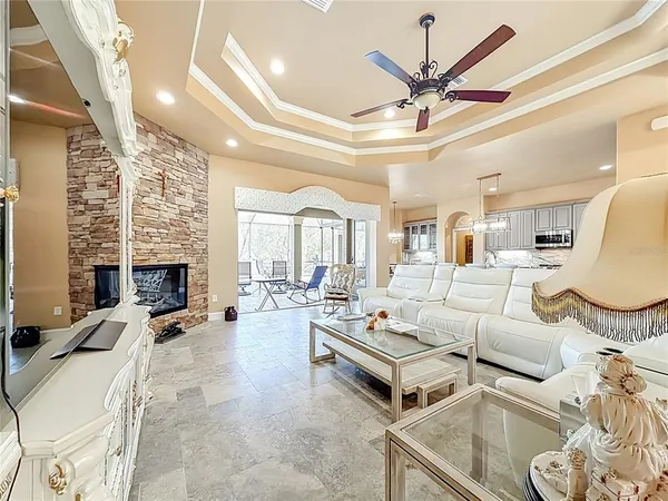 a large kitchen with a table and chairs