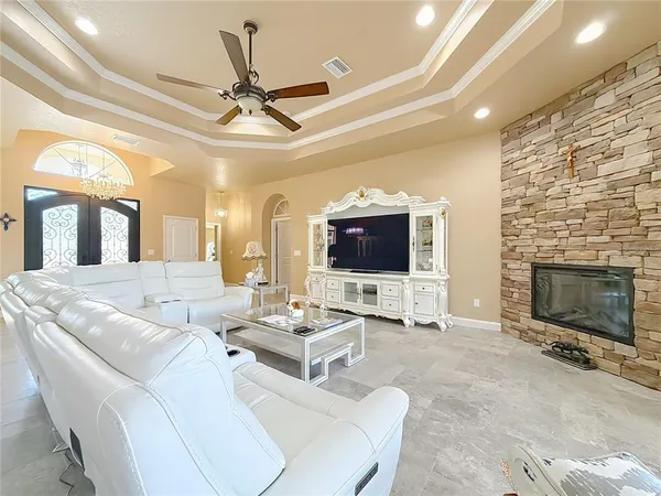 a large kitchen with stainless steel appliances granite countertop a stove and a sink