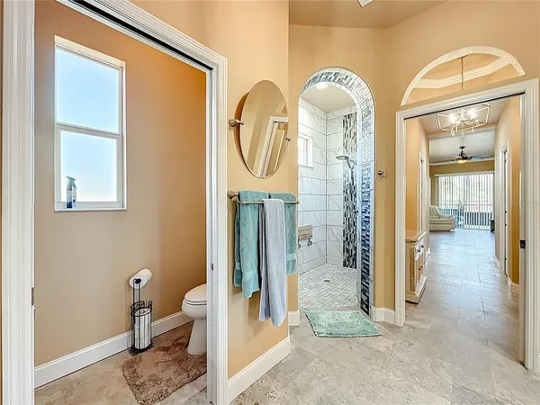 a view of a porch with patio furniture
