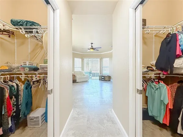 a room with gym equipment and large mirror