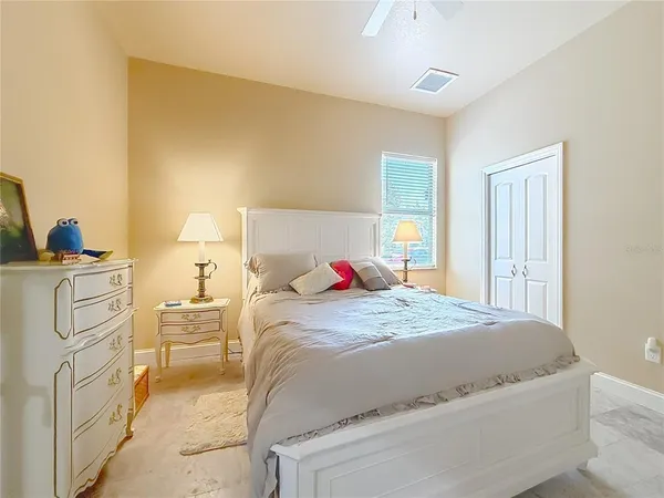 a kitchen with a stove a sink and a window