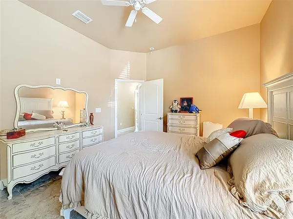 a view of an empty room with a glass door