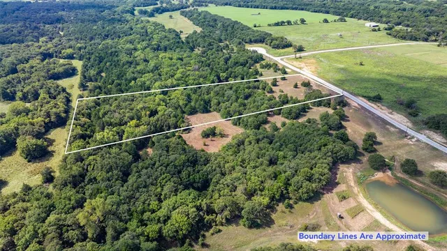 a view of a park with houses