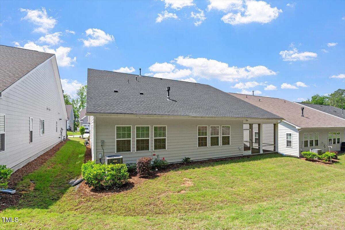 131 English Violet Lane Raleigh, NC 27610 - Photo 35 of 45 a view of a house with a yard