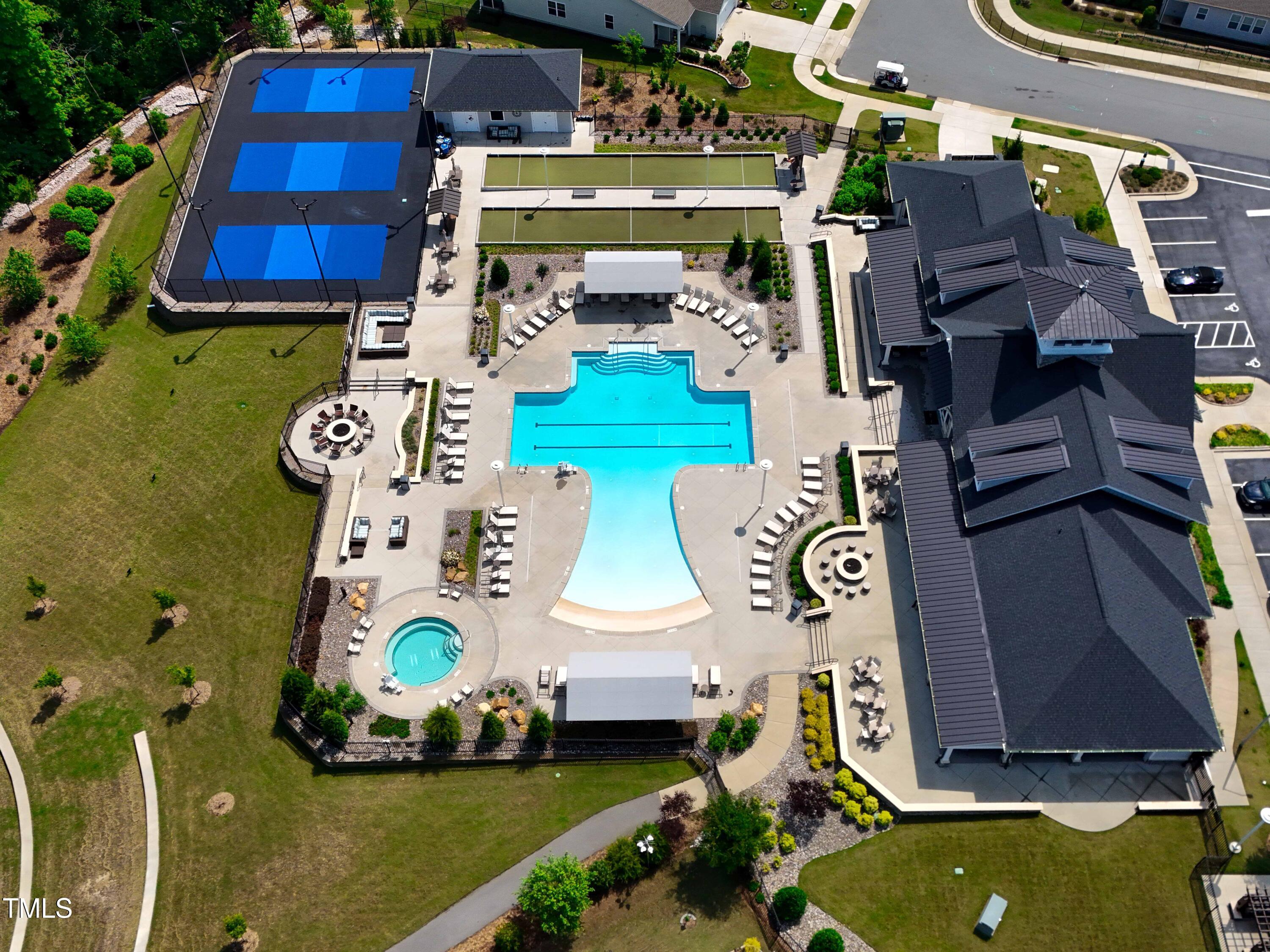 131 English Violet Lane Raleigh, NC 27610 - Photo 41 of 45 an aerial view of a pool patio kitchen and outdoor seating