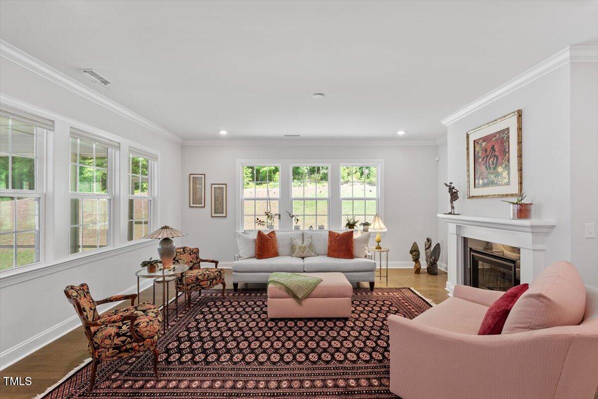 131 English Violet Lane Raleigh, NC 27610 - Photo 5 of 45 a living room with furniture fireplace and window