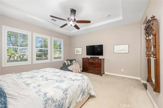 a bathroom with a sink a tub and a mirror
