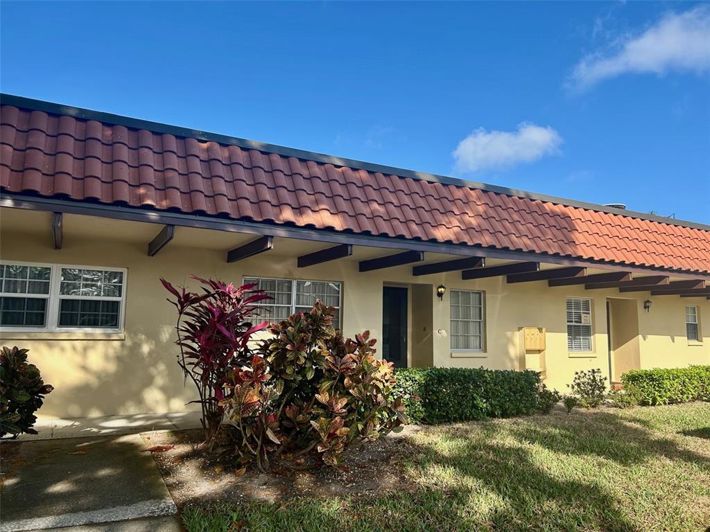 a front view of a house with a porch