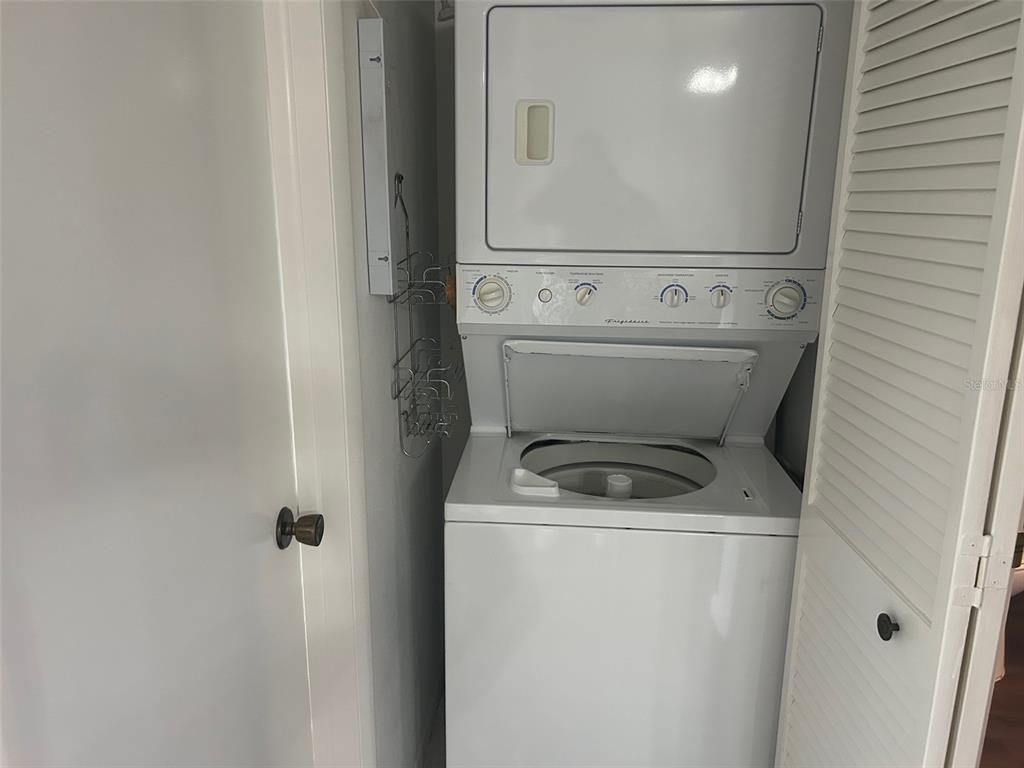 1701 Pinehurst Road, Unit 18C Dunedin, FL 34698 - Photo 12 of 17 a close up view of a washer and dryer