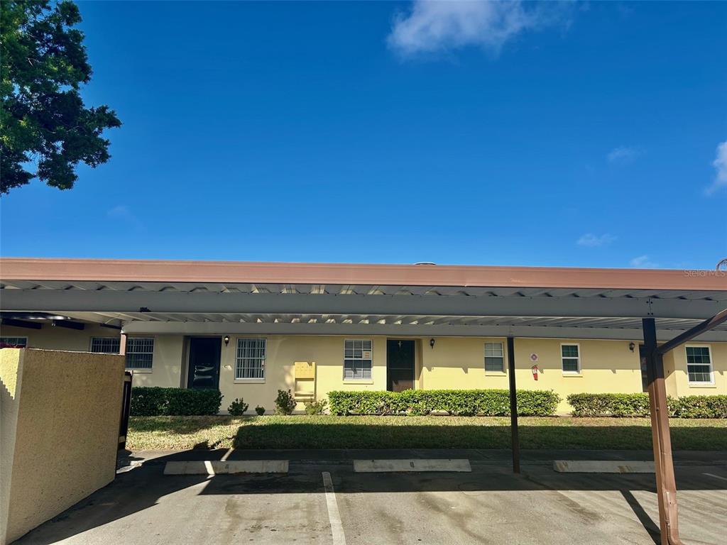 1701 Pinehurst Road, Unit 18C Dunedin, FL 34698 - Photo 13 of 17 a view of a house with a balcony