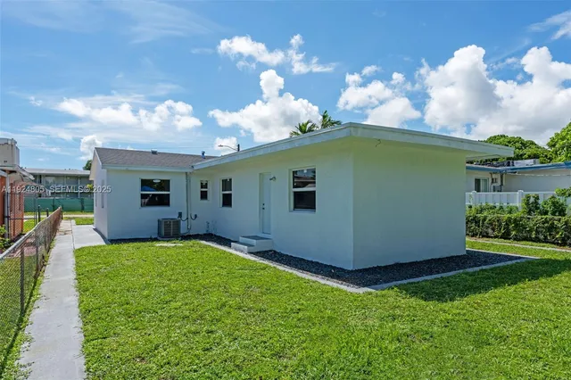 a view of a backyard with a garden