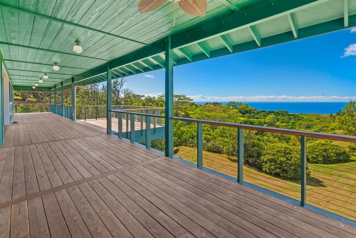 1613 Puu Road, Unit B Kalaheo, HI 96741 - Photo 11 of 27 a view of a balcony with wooden floor