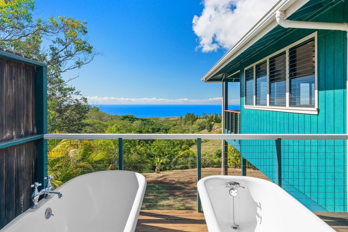 1613 Puu Road, Unit B Kalaheo, HI 96741 - Photo 18 of 27 a view of a chair and tables in the balcony