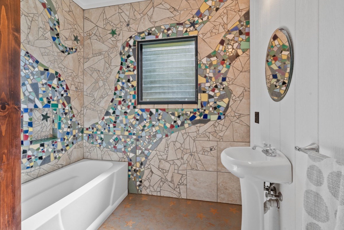 1613 Puu Road, Unit B Kalaheo, HI 96741 - Photo 21 of 27 a bathroom with a bathtub and shower