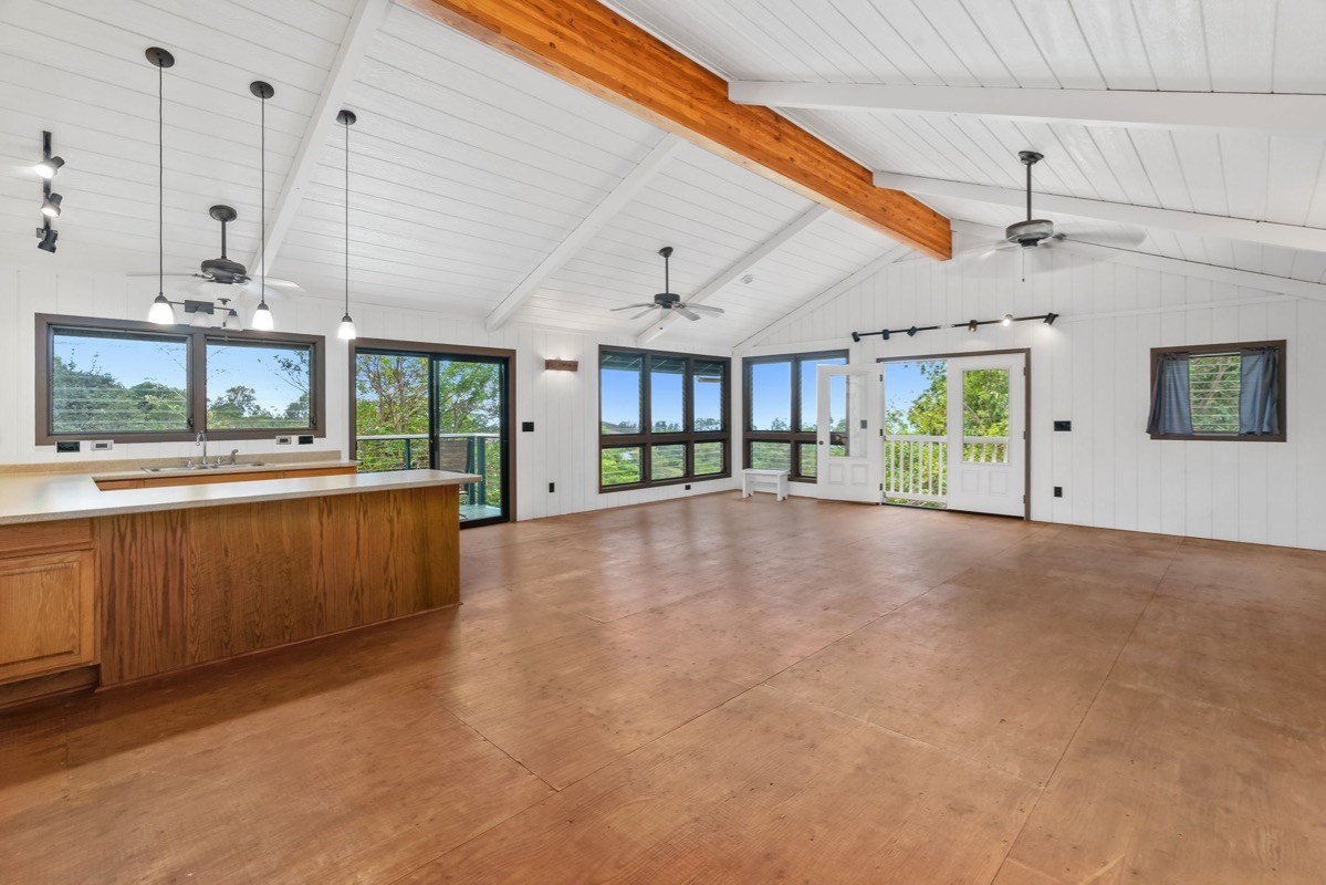 1613 Puu Road, Unit B Kalaheo, HI 96741 - Photo 23 of 27 a view of an empty room with a window