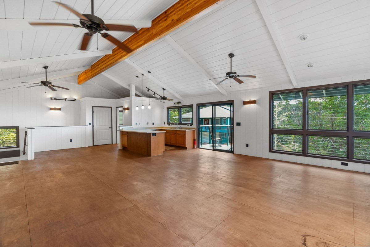 1613 Puu Road, Unit B Kalaheo, HI 96741 - Photo 24 of 27 a view of a livingroom with furniture and windows