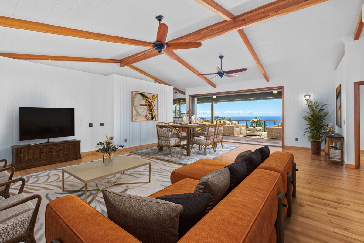 1613 Puu Road, Unit B Kalaheo, HI 96741 - Photo 9 of 27 a living room with furniture and a flat screen tv