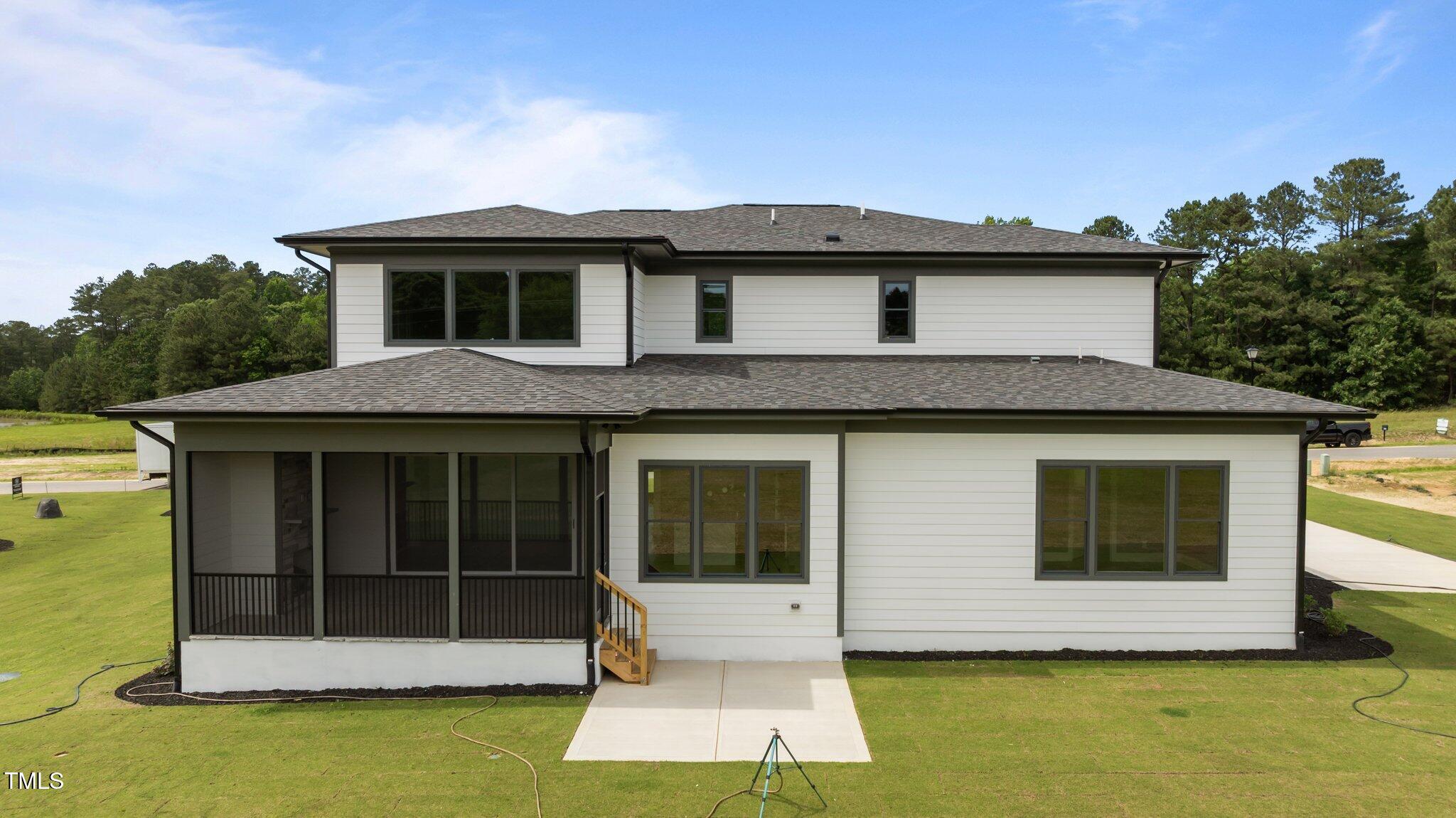 200 Broadleaf Lane Louisburg, NC 27549 - Photo 43 of 57 a view of a house with roof deck