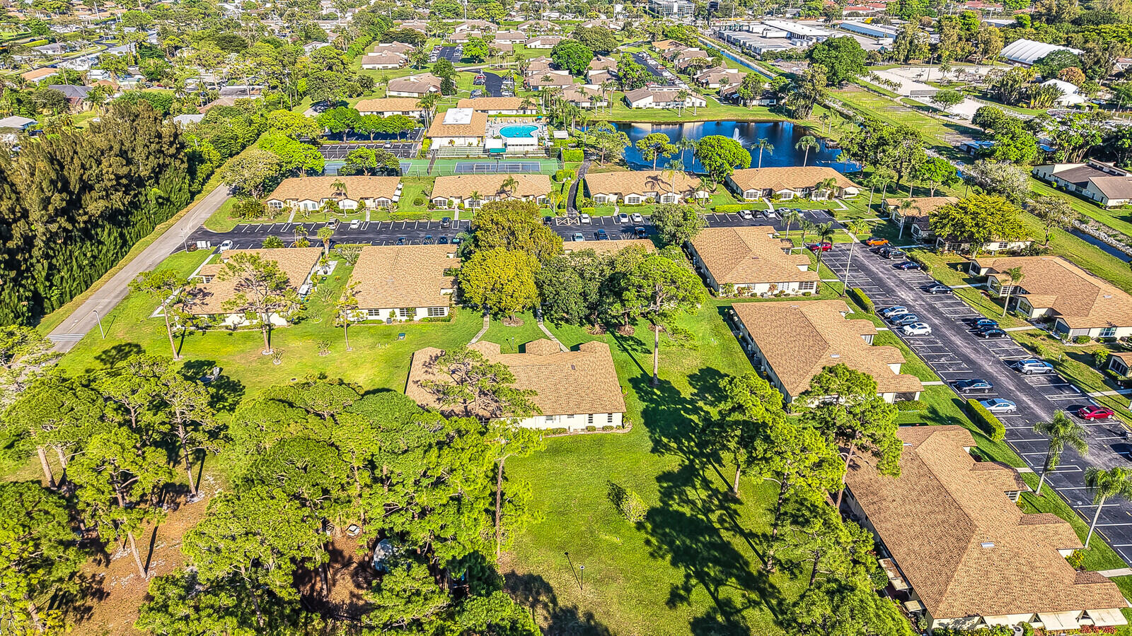 5270 Nesting Way, Unit C Delray Beach, FL 33484 - Photo 31 of 38 an aerial view of residential houses with yard