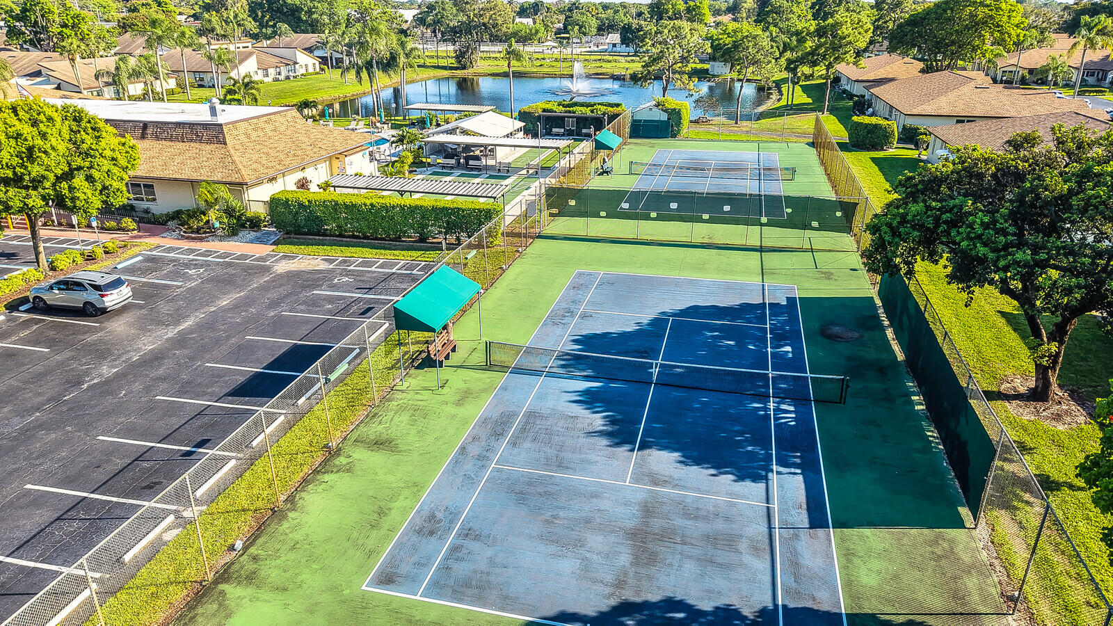 5270 Nesting Way, Unit C Delray Beach, FL 33484 - Photo 36 of 38 an aerial view of a swimming pool