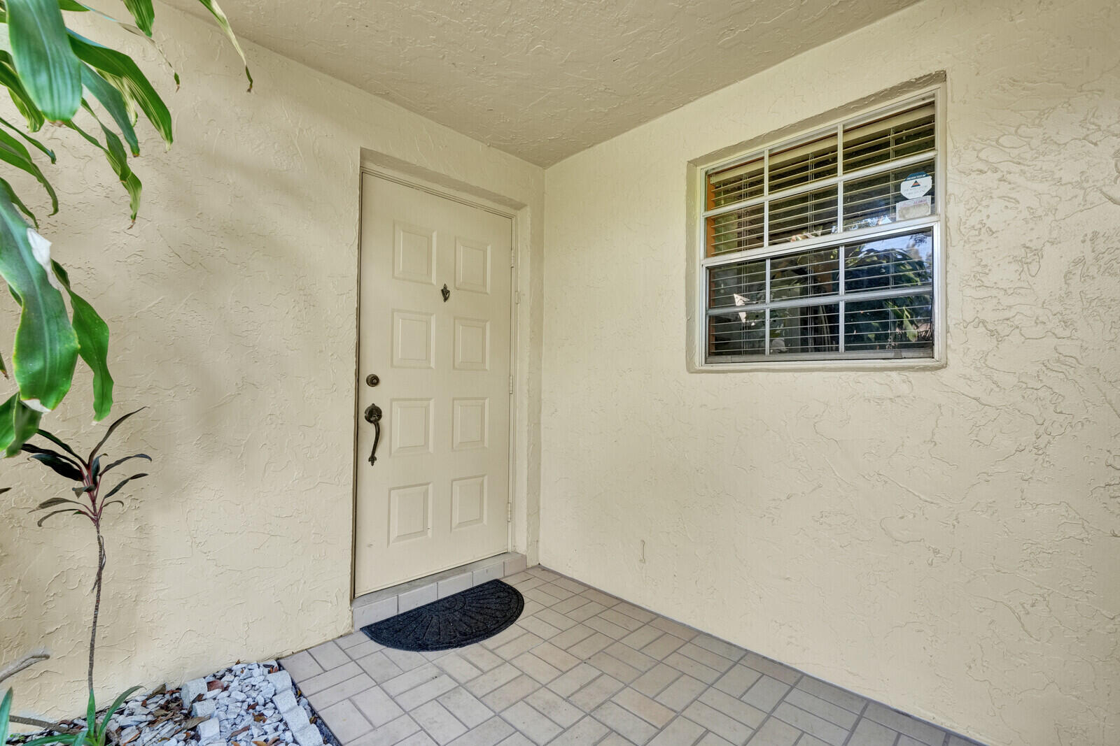 5270 Nesting Way, Unit C Delray Beach, FL 33484 - Photo 4 of 38 a view of an entryway