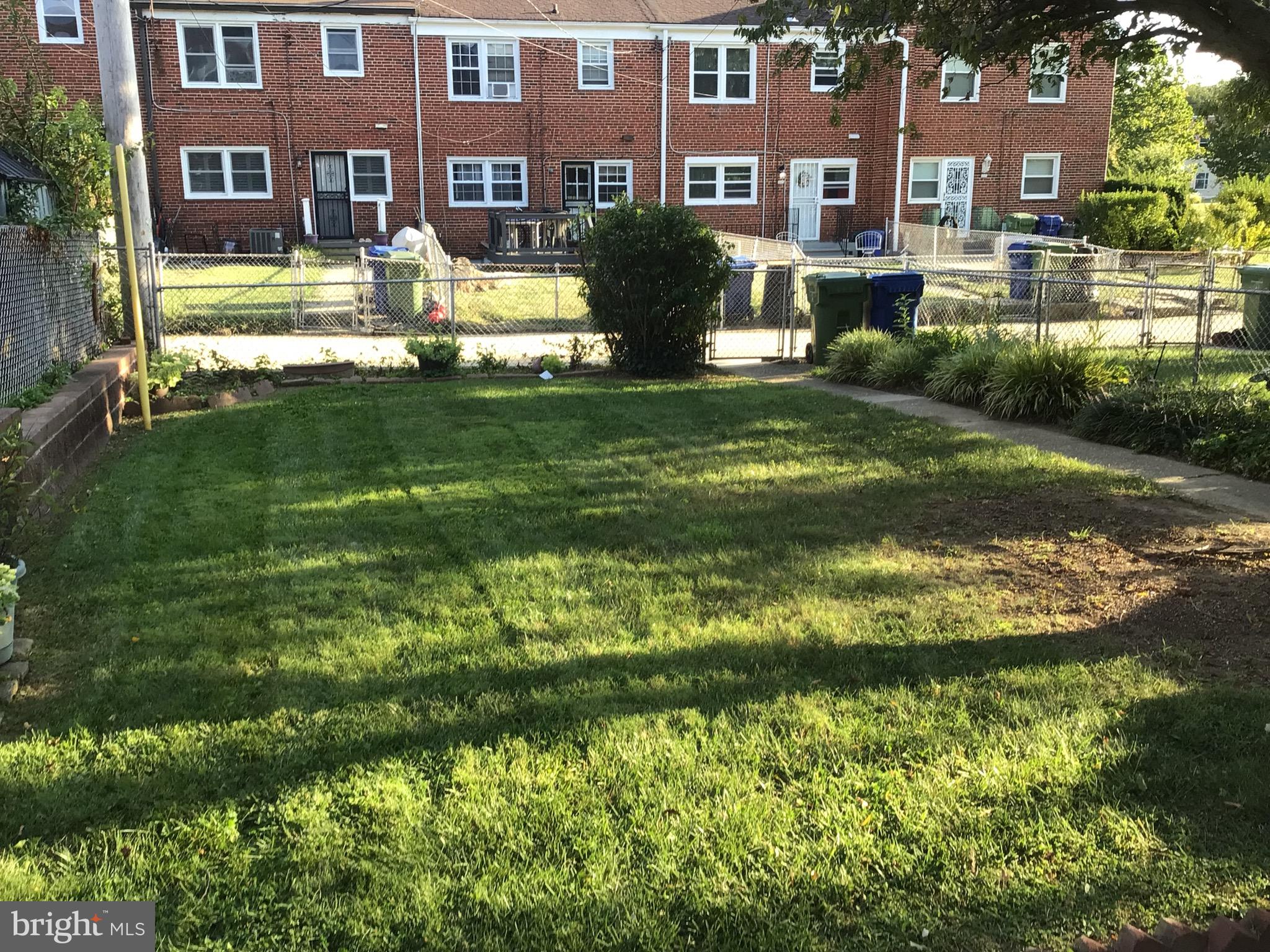 1613 Winford Road Baltimore, MD 21239 - Photo 2 of 42 a view of a building with a yard