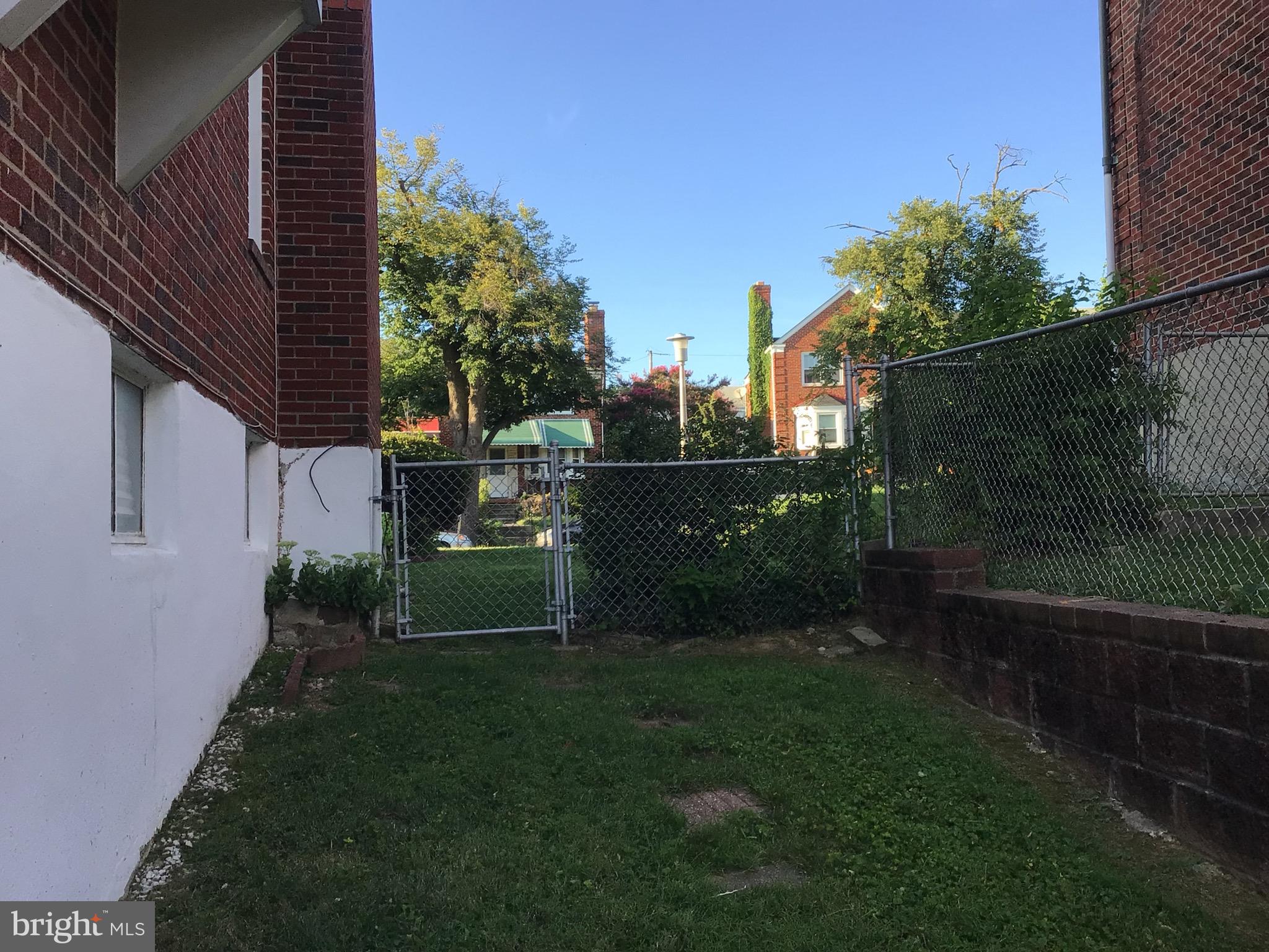 1613 Winford Road Baltimore, MD 21239 - Photo 3 of 42 a view of a back yard