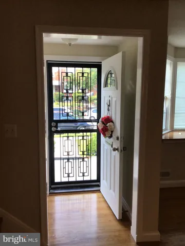 a view of a room that has a large window