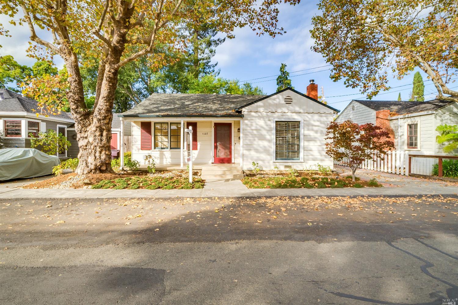 front view of a house with a patio