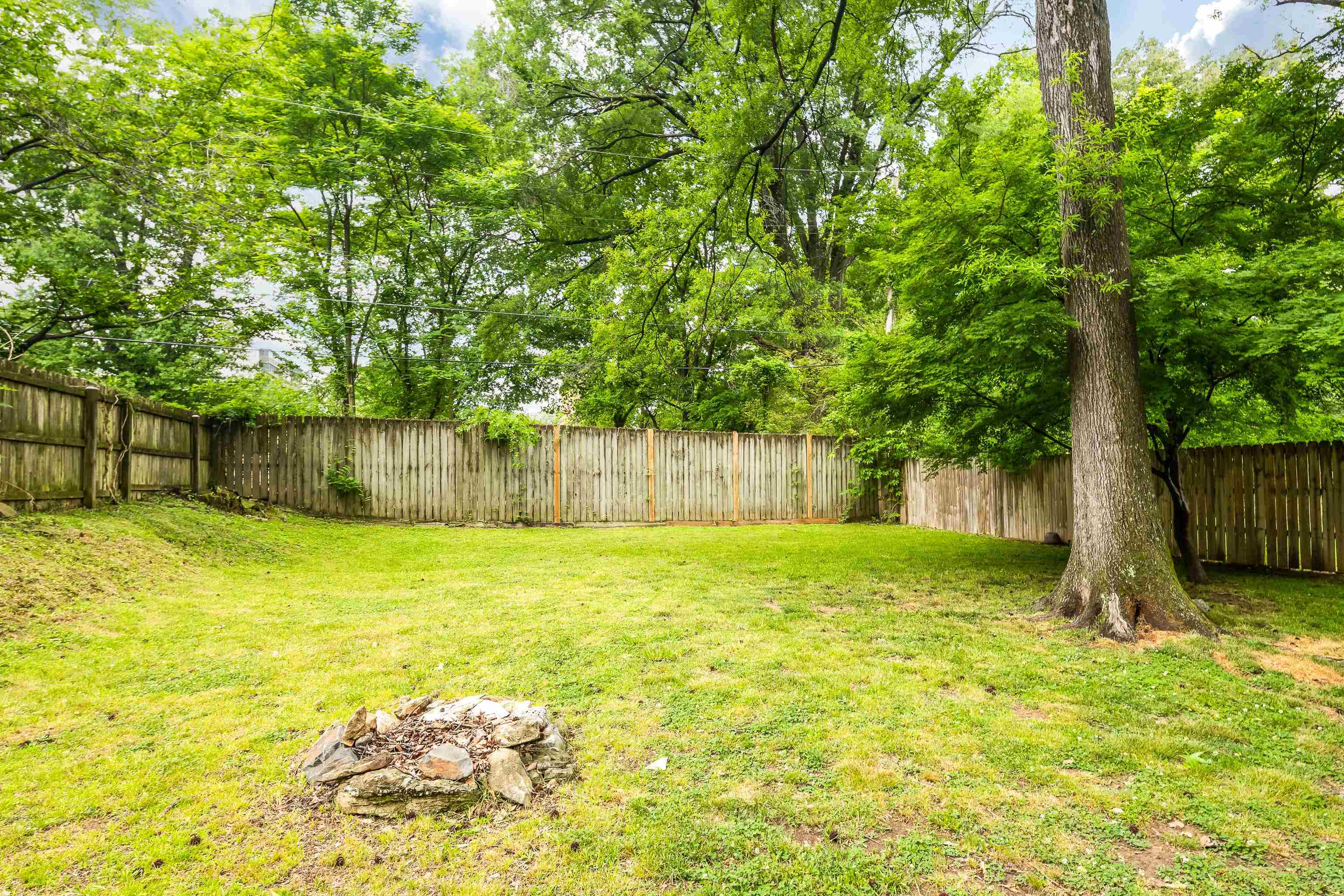 555 South Holmes Street Memphis, TN 38111 - Photo 31 of 40 a view of a yard with a tree