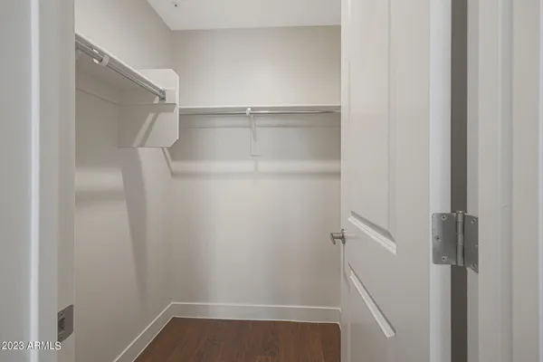 a view of kitchen with cabinets and wooden floor
