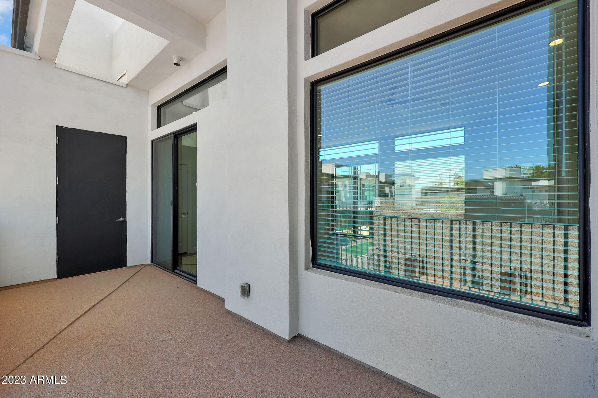 6060 East Baseline Road, Unit 175 Mesa, AZ 85206 - Photo 30 of 45 a view of a door and a balcony