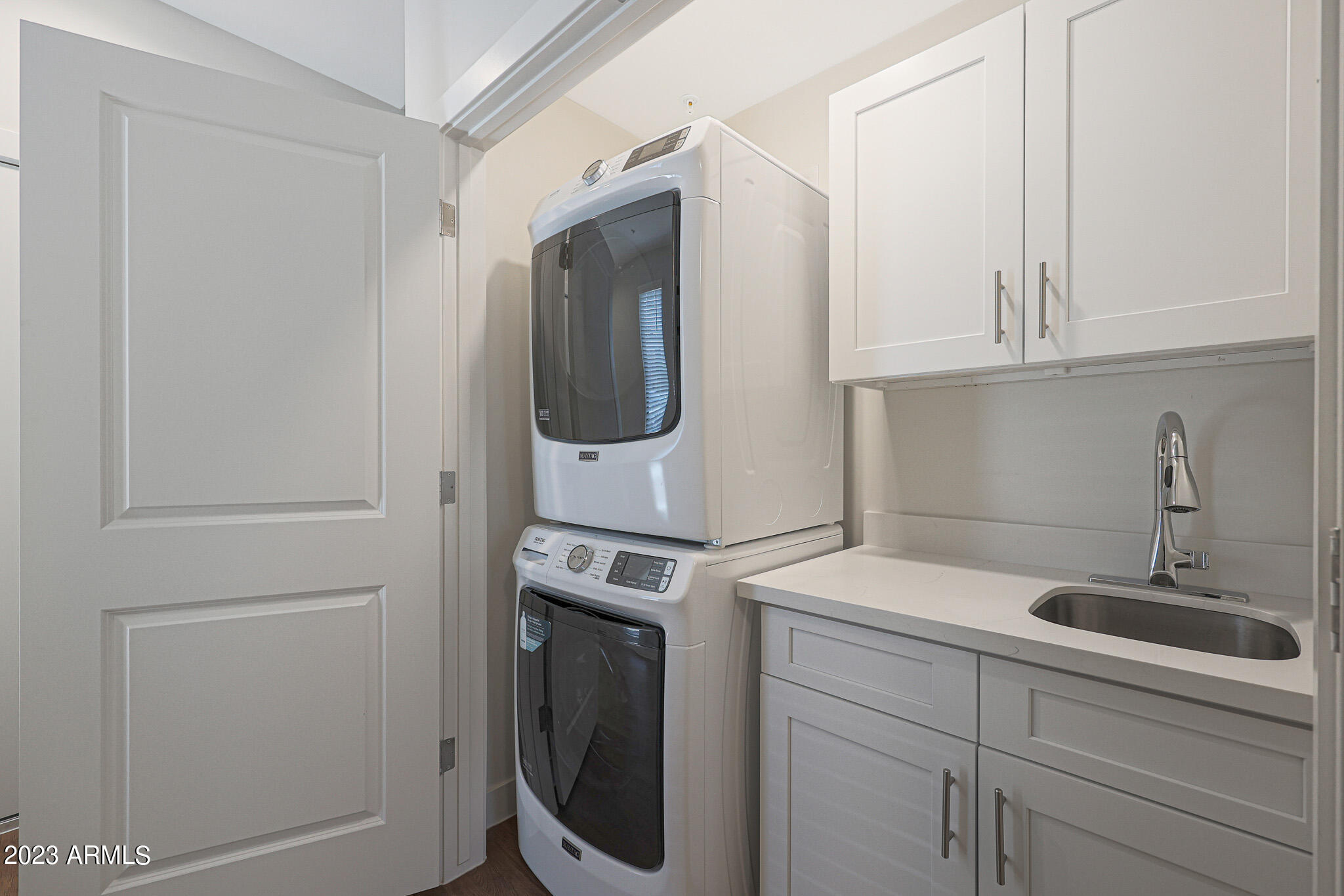 6060 East Baseline Road, Unit 175 Mesa, AZ 85206 - Photo 9 of 45 a utility room with dryer and washer