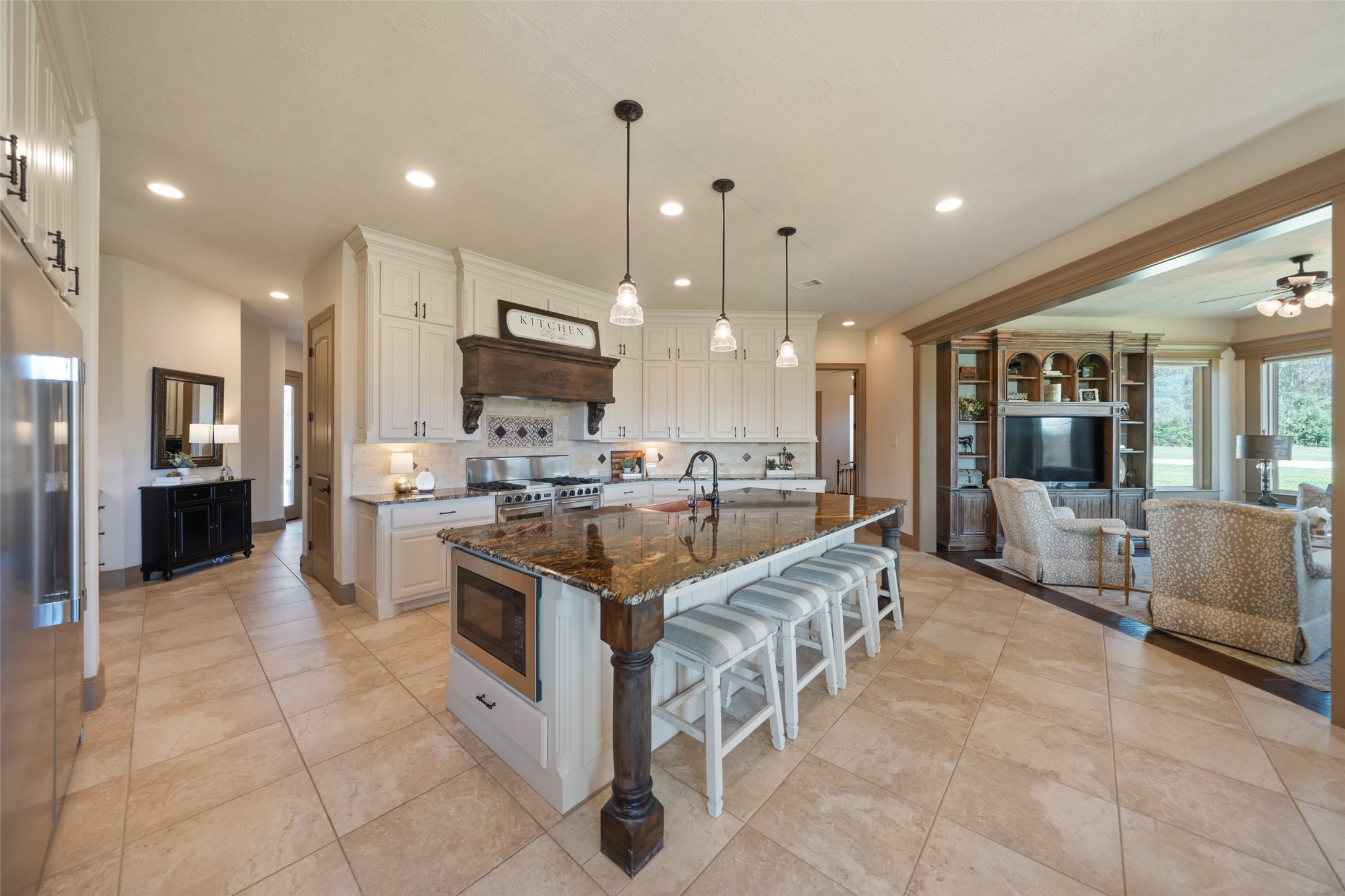 40 Stewart Road New Waverly, TX 77358 - Photo 12 of 50 Main House Kitchen Island with microwave
