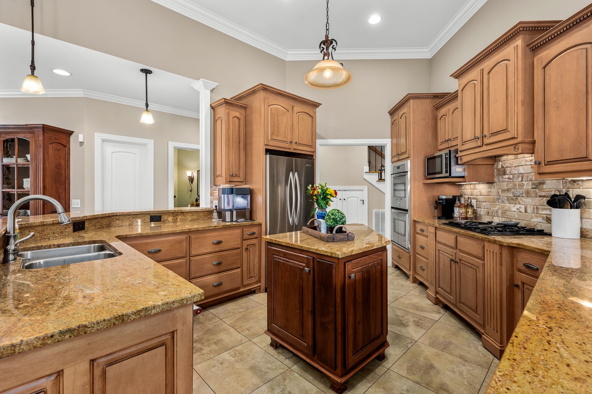 264 Cascade Drive Winchester, TN 37398 - Photo 40 of 86 a kitchen with stainless steel appliances granite countertop a sink stove and refrigerator