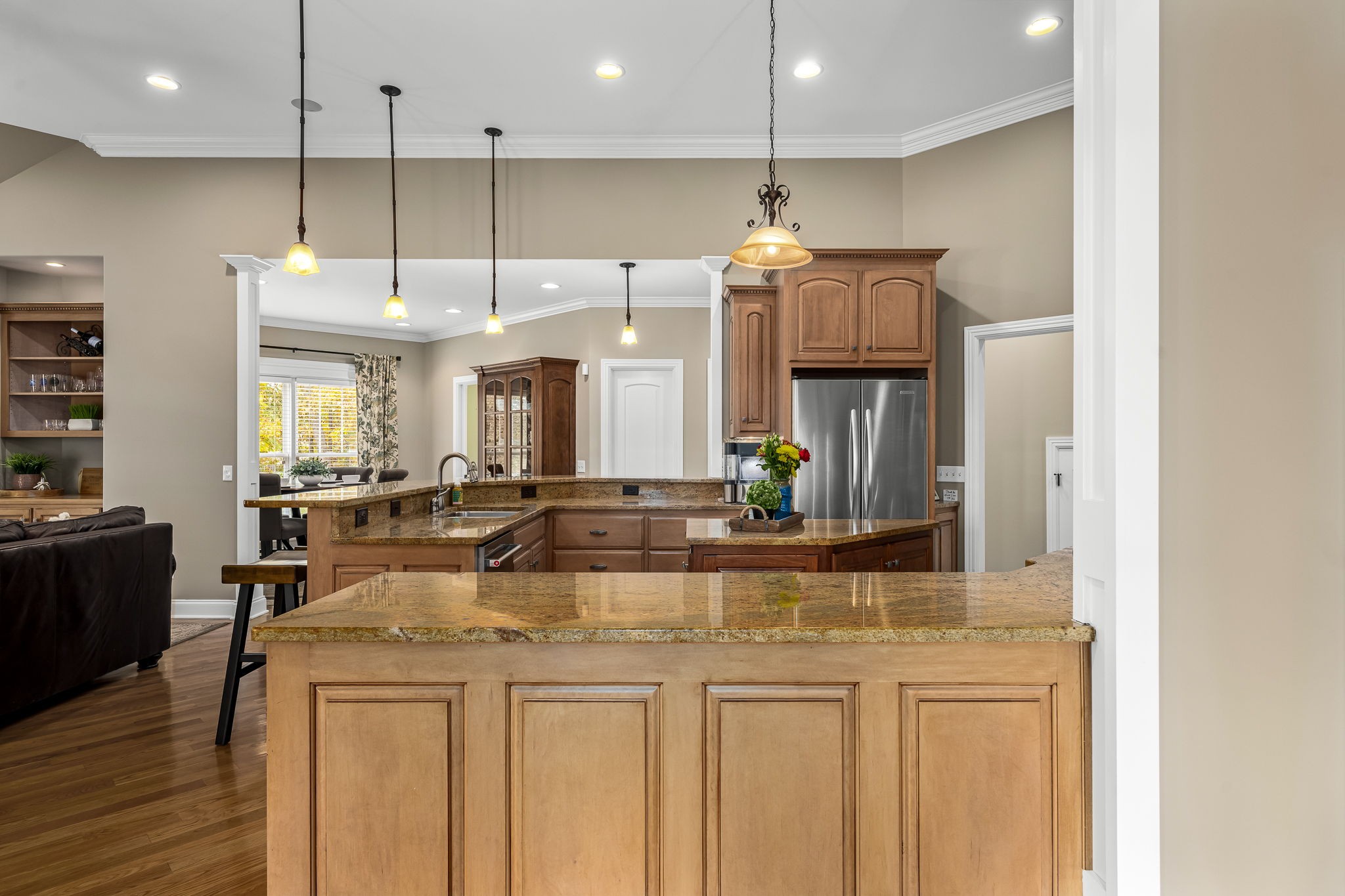 264 Cascade Drive Winchester, TN 37398 - Photo 41 of 86 a kitchen with kitchen island granite countertop a sink and refrigerator