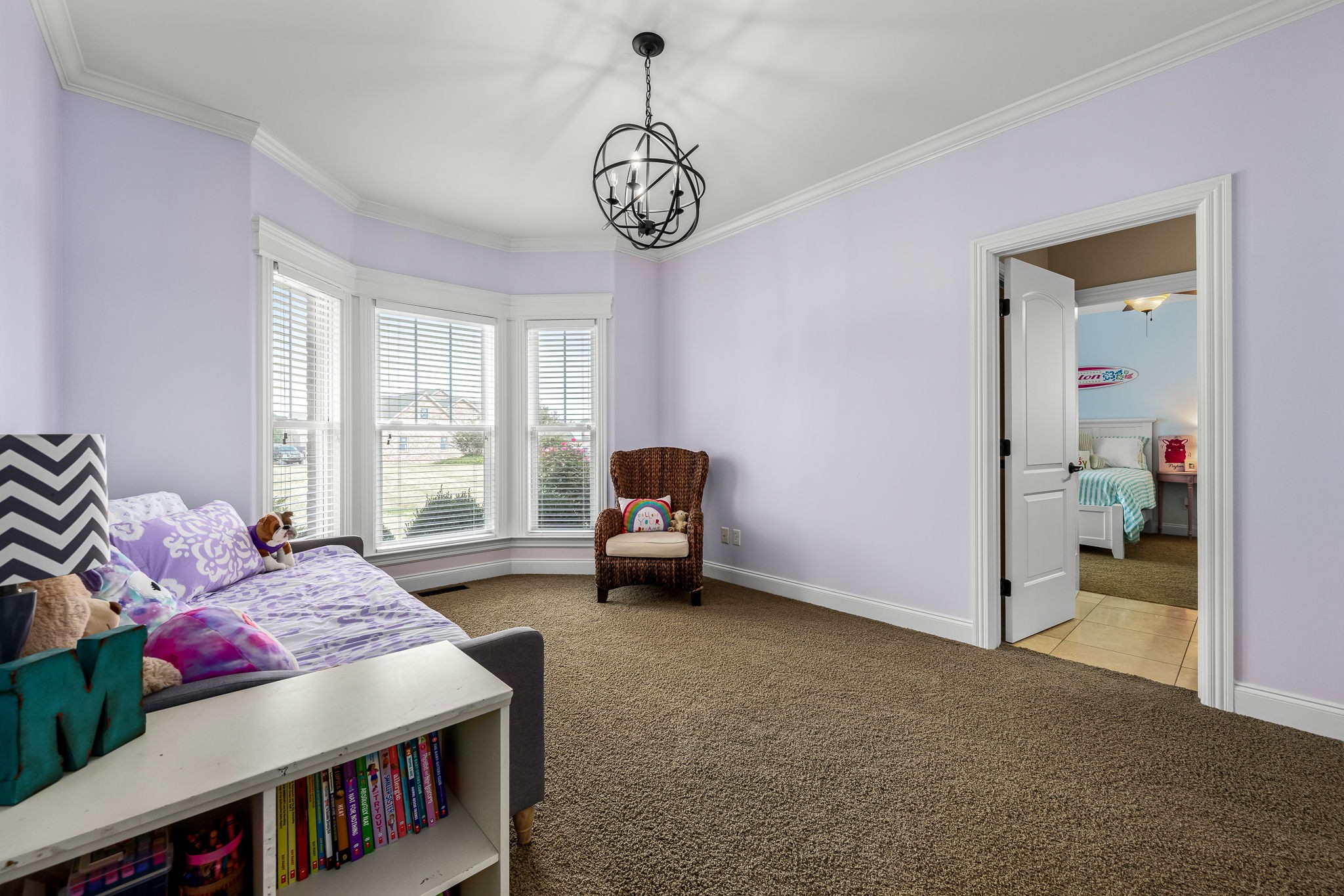 264 Cascade Drive Winchester, TN 37398 - Photo 54 of 86 a living room with furniture a window and a chandelier