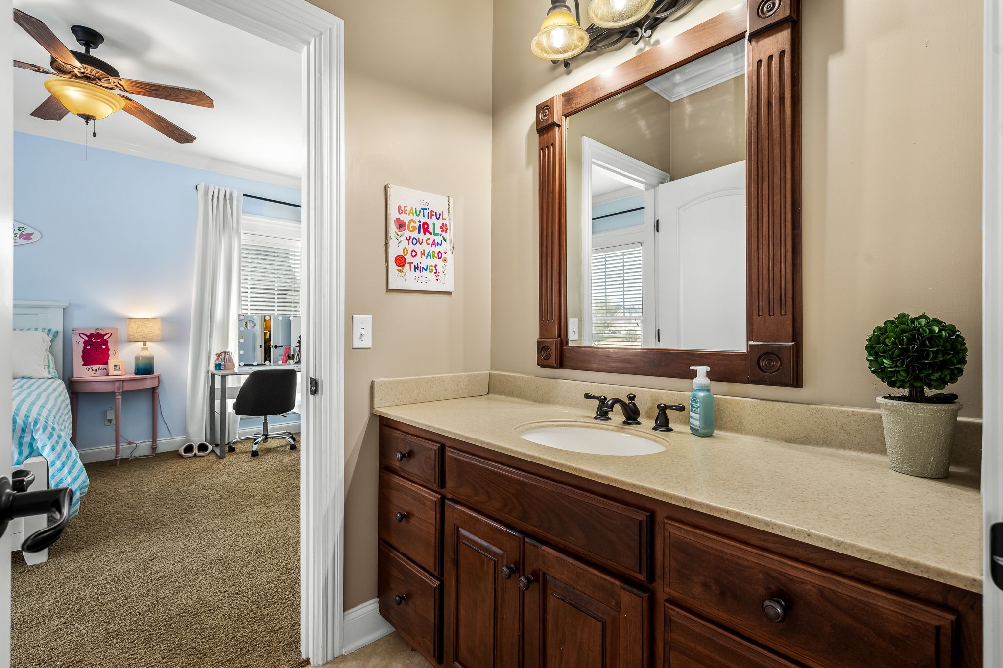 264 Cascade Drive Winchester, TN 37398 - Photo 55 of 86 a en suite bathroom with a sink double vanity and a mirror