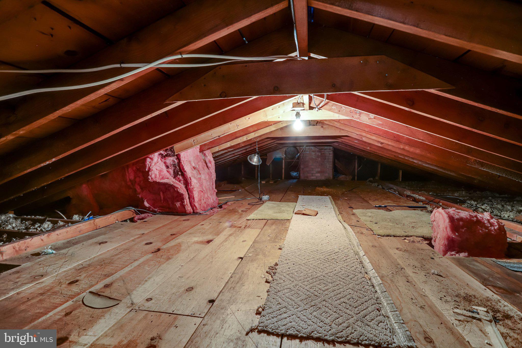 12830 Oxon Road Herndon, VA 20171 - Photo 35 of 61 Attic access has some wood flooring for storage.