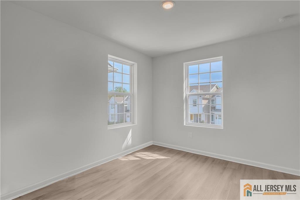 204 Honeysuckle Lane Warren, NJ 07059 - Photo 13 of 17 an empty room with windows