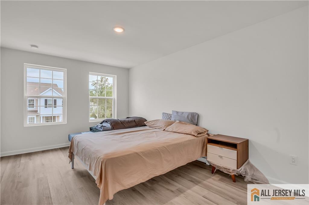 204 Honeysuckle Lane Warren, NJ 07059 - Photo 14 of 17 a bedroom with a bed and window
