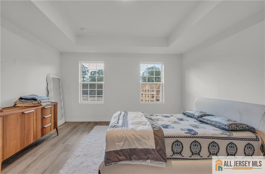 204 Honeysuckle Lane Warren, NJ 07059 - Photo 9 of 17 a bedroom with a stove and a window