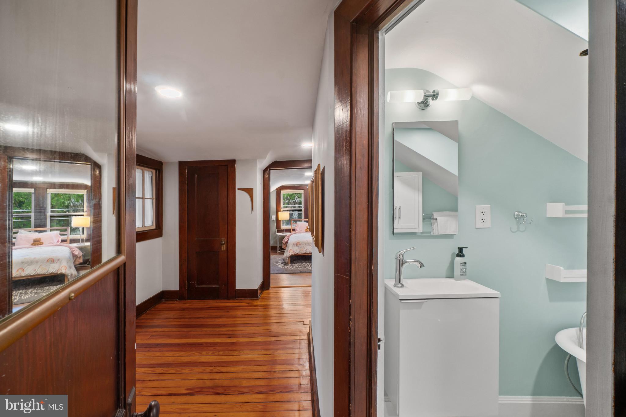 2900 Rueckert Avenue Baltimore, MD 21214 - Photo 29 of 40 a bathroom with a sink and a mirror