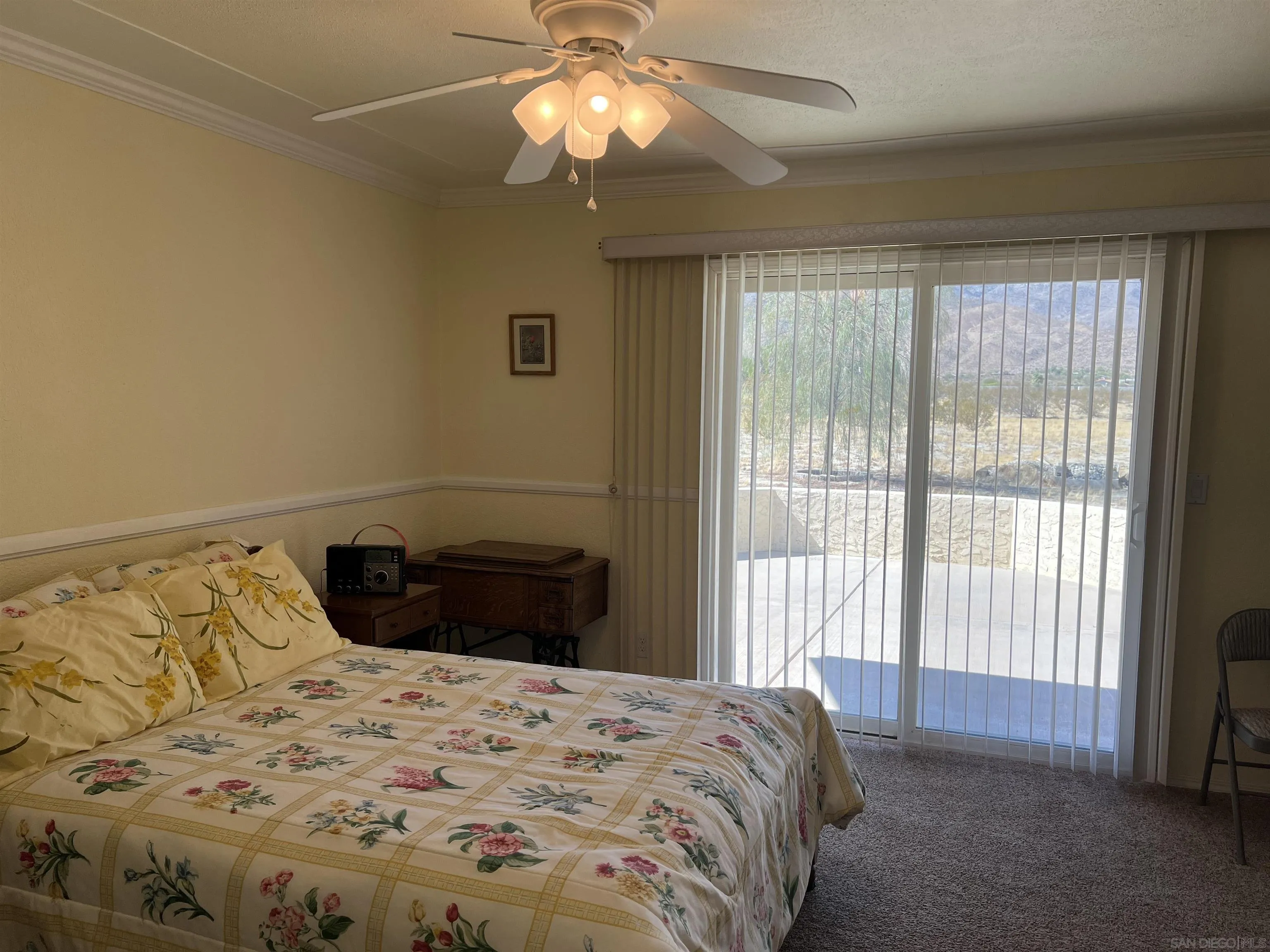 2960 Frying Pan Road Borrego Springs, CA 92004 - Photo 21 of 28 a bedroom with a bed and a window
