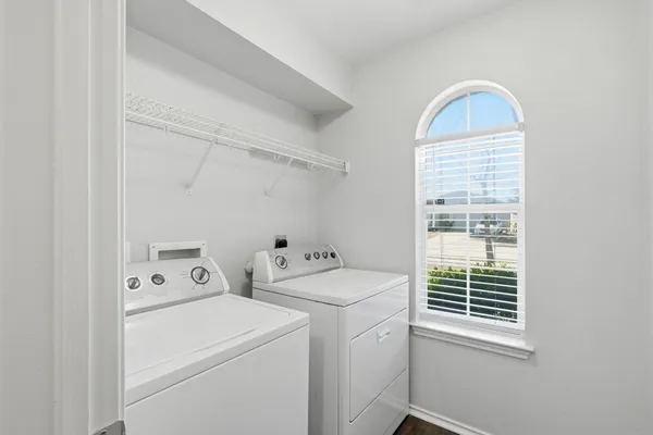 a utility room with dryer and washer