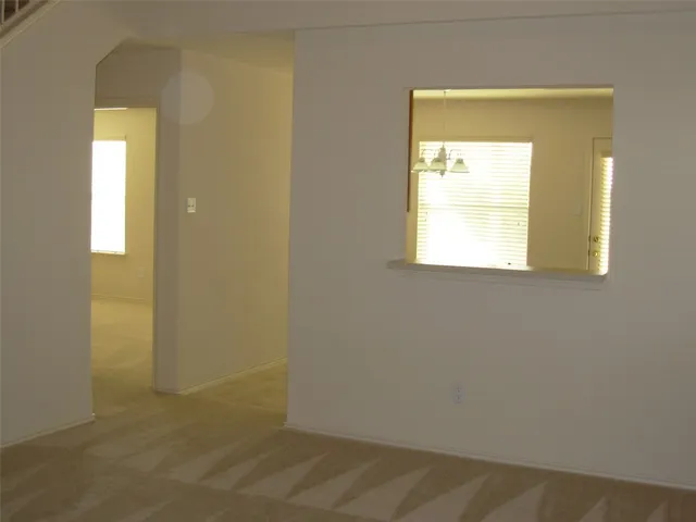 an empty room with a window