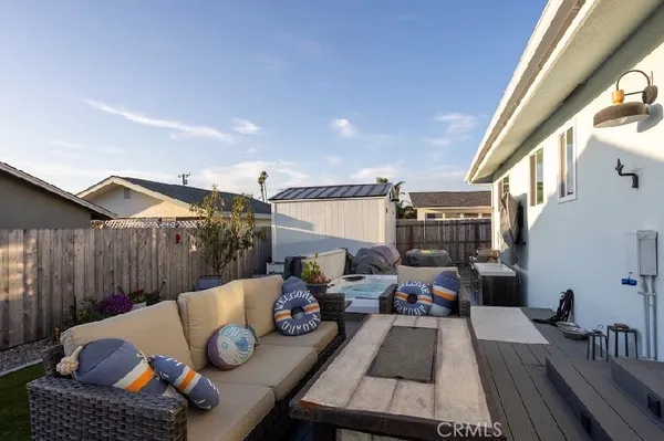 a bed room with furniture rug and window
